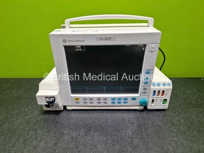 GE Datex Ohmeda F-CM1-05 Anaesthesia Monitor (Powers Up) with 1 x GE E-PRESTN-00 Module with ECG, SpO2, NIBP, T1-T2 and P1-P2 Options and 1 x GE Type E-CAi0-00 Module (Crack in Casing - See Photo) with D-Fend Water Trap *SN