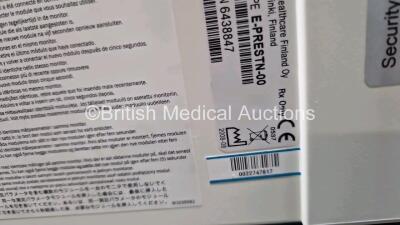 GE Datex Ohmeda F-CM1-05 Anaesthesia Monitor (Powers Up) with 1 x GE E-PRESTN-00 Module with ECG, SpO2, NIBP, T1-T2 and P1-P2 Options and 1 x GE Type E-CAi0-00 Module (Crack in Casing - See Photo) with D-Fend Water Trap *SN - 5