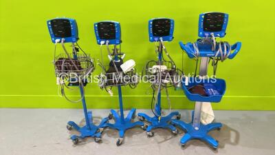 4 x GE Dinamap Carescape V100 Vital Signs Monitors on Stands with Selection of Leads (All Power Up) *S/N SH612450188SA / SH614524586SA / SH613060509SA / SDT10080121SP*