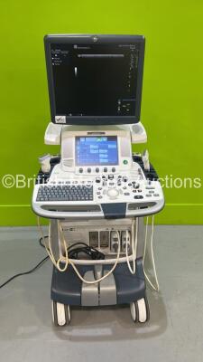 GE Logiq E9 Flat Screen Ultrasound Scanner *S/N 129353US9* **Mfd 2014* Software Version R4 Software Revision 3.0 with 2 x Transducers / Probes (ML6-15-D Ref 519903 *Mfd 2014* and C1-6-D Ref 5418916 *Mfd 2019*) (Powers Up - Keyboard will Not Lock in Park P