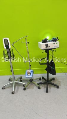 Mixed Lot Including 1 x DeVilbiss UltraNeb on Stand, 1 x LuxTec 9300XSP Light Source on Stand with Headlamp and 1 x Welch Allyn 420 Series Patient Monitor on Stand (All Power Up) *S/N 125507*