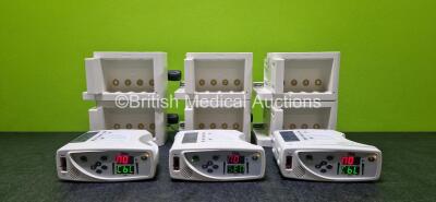 Job Lot Including 3 x MasimoSET Rad-8 Signal Extraction Pulse Oximeters (All Power Up and 1 x Loose Casing - See Photo) and 6 x Philips Ref 865243 Module Racks *SN M145852 / M28923 / M145757*