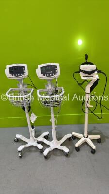 2 x Welch Allyn 53N00 Vital Signs Monitors on Stands and 1 x Welch Allyn Solarc Light on Stand (All Power Up) *S/N 106662 / JA125552 / JA115966*