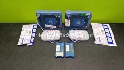 2 x Philips Heartstart FRx Defibrillators (Both Power Up) in Case with 4 x M5070A LiMnO2 Batteries *Install Before 2029 / 2027 / 2027 / 2026 * and 4 x Smart Pads 2 - 4