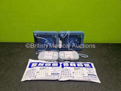 2 x Philips Heartstart FRx Defibrillators (Both Power Up) in Case with 2 x M5070A LiMnO2 Batteries *Install Before 2027 / 2025 and 4 x Smart Pads 2