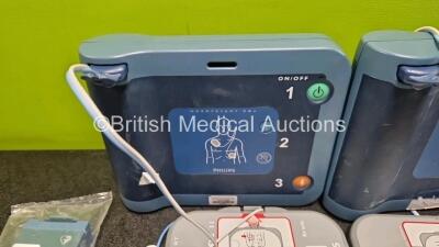 2 x Philips Heartstart FRx Defibrillators (Both Power Up) in Case with 4 x M5070A LiMnO2 Batteries *Install Before 2029 / 2027 / 2026 / 2024* and 4 x Smart Pads 2 - 2