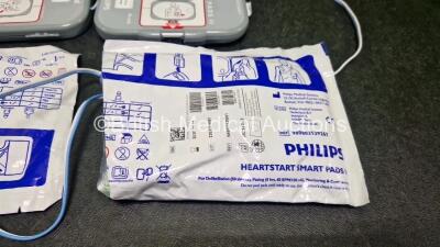 2 x Philips Heartstart FRx Defibrillators (Both Power Up) in Case with x M5070A LiMnO2 Batteries *Install Before - 2026 * and 4 x Smart Pads 2 - 5