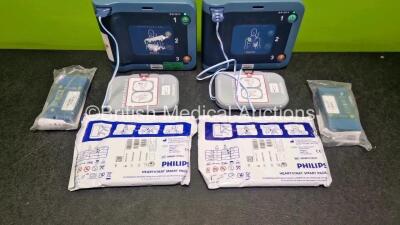 2 x Philips Heartstart FRx Defibrillators (Both Power Up) in Case with 4 x M5070A LiMnO2 Batteries *Install Before 2024 / 2024 / 2023 / 2018 * and 4 x Smart Pads 2 - 4