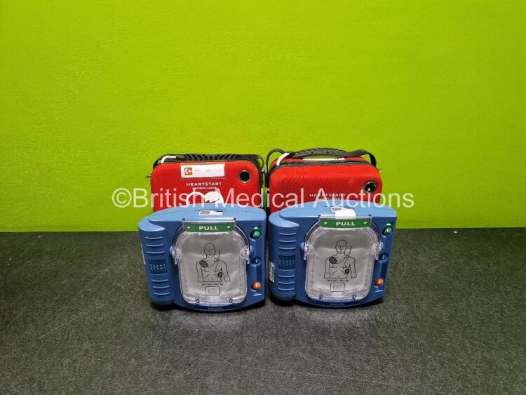 2 x Philips Heartstart HS1 Defibrillators (Both Power Up with Stock Battery Stock Battery Not Included) In Carry Case