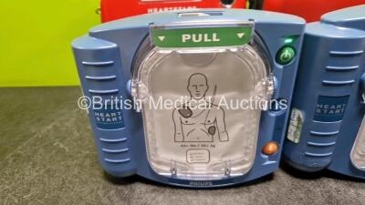 2 x Philips Heartstart HS1 Defibrillators (Both Power Up with Stock Battery Stock Battery Not Included) In Carry Case - 2