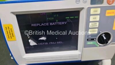 Zoll R Series BLS Defibrillator / Monitor (Powers Up with Stock Battery Stock Battery Not Included) Including Pacer, ECG and Printer Options with 1 x Paddle Lead and 3 Lead ECG Lead *SN AF14C035684* - 2