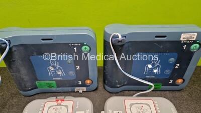 2 x Philips Heartstart FRx Defibrillators (Both Power Up) in Case with 2 x M5070A LiMnO2 Batteries *Install Before 2027 / 2027* and 4 x Smart Pads 2 - 2