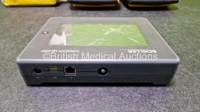 Job Lot Including 1 x Laerdal Heartstart 911 AED (No Power Due to Suspected Flat Battery), 1 x Schiller Cardiovit MS-2007 Interpretive ECG Machine (Cracked Screen - See Photo) and Physio Control Lifepak CR Plus Defibrillators (1 x Powers Up, 1 x Missing L - 4