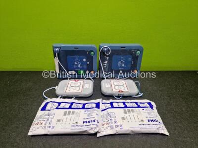 2 x Philips Heartstart FRx Defibrillators (Both Power Up) in Case with 2 x M5070A LiMnO2 Batteries *Install Before 2027 / 2024* and 4 x Smart Pads 2