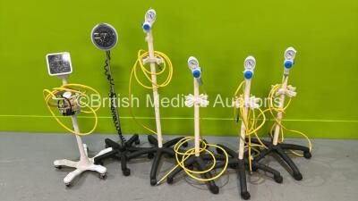 4 x VacSax Oxygen Regulators with Hoses on Stands and 2 x BP Meters on Stands