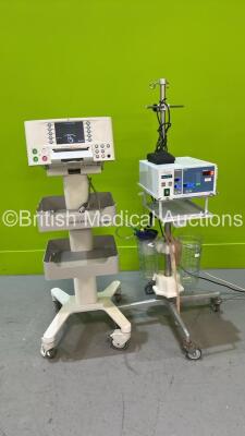 1 x Hologic Aquilex Fluid Control Management System with Cups and Footswitch on Stand (Powers Up) and 1 x Sonicaid FM800 Encore Fetal Monitor on Stand (Powers Up) *1606CE0650 / 751CX0200291*