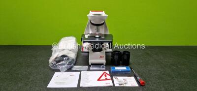 Leica DM750 Benchtop Microscope (Powers Up) with 2 x HC PLAN 10x/20 Eyepieces and 1 x HI PLAN 20x/0.40 PH 1 Optic in Box