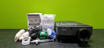 Mixed Lot Including 1 x Panasonic LCD Projector Model PT-L797PEL (Draws Power), 1 x Box of NObreath Mouthpieces, 3 x Thermo Scientific Tencel Cuvettes, 1 x Covidien Genius 2 Thermometer, 1 x Verathon BladderScan Charging Cradle, 1 x Bardscan II NiMH Batte