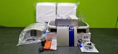 Mixed Lot Including 2 x Katrin Hand Towel M Dispensers *Like New in Box*, 1 x Optima Juniorplus Hand Dryer in Box, 1 x Humantechnik LA-90 Portable Inductive Loop System, 1 x Kensington Solemate Footrest and 1 x Serres Suction Cup