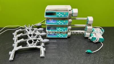 4 x B.Braun Perfusor Space Syringe Pumps (3 x Power Up - 1 x No Power - Damaged Port) with 4 x Pole Clamps and 2 x Power Supplies *SN 97875 / 178210 / 10124 / 177978*