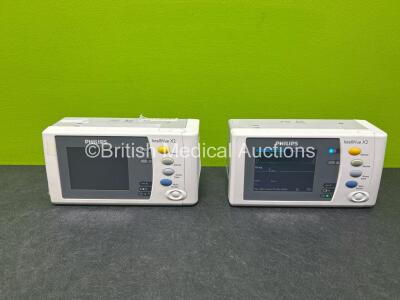 2 x Philips IntelliVue X2 Handheld Patient Monitors (Both Power Up with Stock Batteries - Stock Batteries Not Included) Including ECG, SpO2, NBP, Press and Temp Options with 2 x Philips M4607A Batteries (Both Flat Batteries) *SN DE535L1256 / DE575P0096*