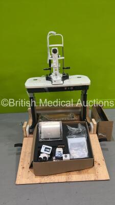 Lumenis Digital Duet SLT - YAG System Ref GAS900000DIG Series 002 with Binoculars, Eyepieces, Manual and Key on Motorized Table (The Slit Lamp is Misaligned and not Possible to Realign.  The Tabletop is Damaged and Needs Replacing as the Countersink in th