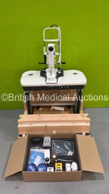 Lumenis Digital Duet SLT - YAG System Ref GAS900000DIG Series 002 with Binoculars, Eyepieces, Manual and Key on Motorized Table (The Device is Damaged on the Base Further Covers were Removed but it is not Repairable, The Table Top is Missing, Spares and R