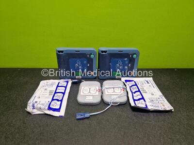 2 x Philips Heartstart FRx Defibrillators (Both Power Up 1 x without Power Light) in Case with 2 x M5070A LiMnO2 Batteries *Install Before 2027 / 2024* and 4 x Smart Pads 2