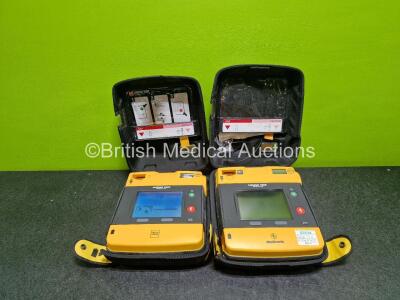 2 x Medtronic Lifepak 1000 Defibrillators (Both Power Up with Stock Battery Stock Battery Not Included) in Case