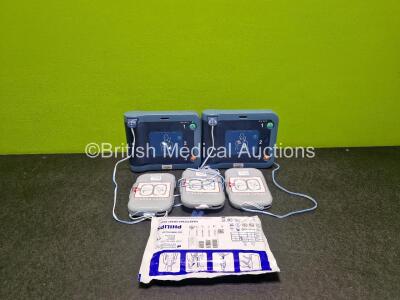 2 x Philips Heartstart FRx Defibrillators (Both Power Up) in Case with 2 x M5070A LiMnO2 Batteries *Install Before 2027 / 2024* and 4 x Smart Pads 2