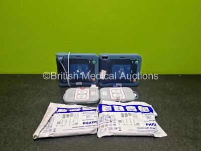 2 x Philips Heartstart FRx Defibrillators (Both Power Up) in Case with 2 x M5070A LiMnO2 Batteries *Install Before 2024 / 2024* and 4 x Smart Pads 2