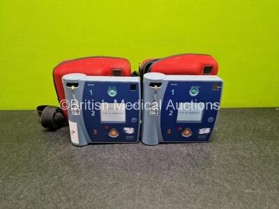 2 x Philips Heartstart FR2+ Defibrillators (Both Power Up) in Case with 2 x LiMnO2 Batteries *Install Before 2023 / 2022* **SN 0911890765 / 0204111390*