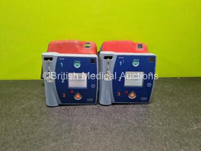 2 x Philips Heartstart FR2+ Defibrillators (Both Power Up) in Case with 2 x LiMnO2 Batteries *Install Before 2024 / 2023* **SN 0105139631 / 0204111405*