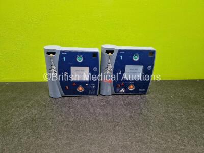 2 x Philips Heartstart FR2+ Defibrillators (Both Power Up) in Case with 2 x LiMnO2 Batteries *Install Before 2024 / 2024* **SN 0204111452 / 0204111307*