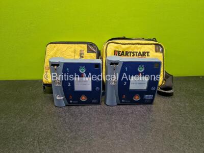 2 x Laerdal Heartstart FR2+ Defibrillators (Both Power Up) in Case with 2 x LiMnO2 Batteries *Install Before 2025 / 2025* **SN 0205141699 / 0805164742*