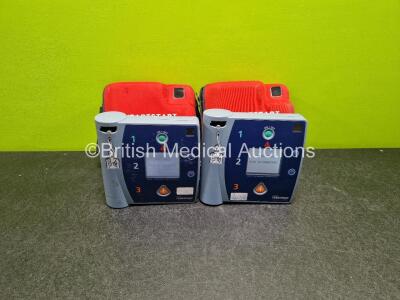 2 x Laerdal Heartstart FR2 Defibrillators (Both Power Up) in Case with 2 x LiMnO2 Batteries *Install Before 2025 / 2023* **SN 0301025462 / 0102053155*