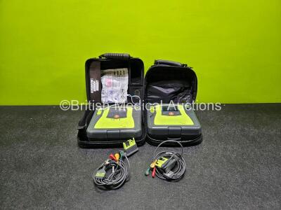 2 x Zoll AEDPro Defibrillators (Both Power Up, Both with Scratches on Screen - See Photos) in Case with 2 x Li-ion Batteries