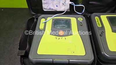 2 x Zoll AEDPro Defibrillators (Both Power Up, Both with Scratches on Screen - See Photos) in Case with 2 x Li-ion Batteries - 2