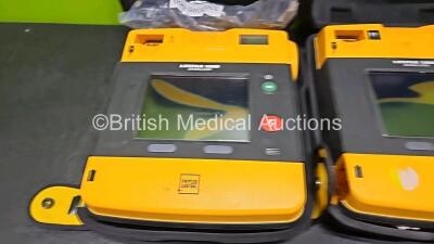 2 x Medtronic Lifepak 1000 Defibrillators (Both with Damaged Screen - See Photos) - 2