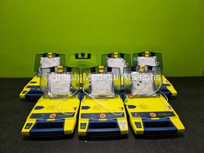 Job Lot Including 5 x Cardiac Science Powerheart AED G3 Defibrillators, 1 x Cardiac Science Powerheart AED G3 PRO Defibrillator (All Power Up) and 1 x Cardiac Science Powerheart AED Trainer (No Power)