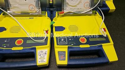 Job Lot Including 5 x Cardiac Science Powerheart AED G3 Defibrillators, 1 x Cardiac Science Powerheart AED G3 PRO Defibrillator (All Power Up) and 1 x Cardiac Science Powerheart AED Trainer (No Power) - 3