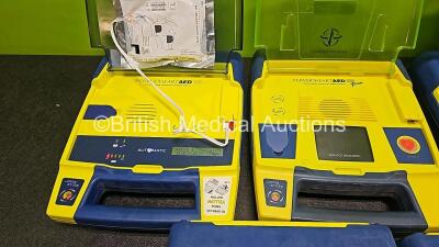 Job Lot Including 5 x Cardiac Science Powerheart AED G3 Defibrillators, 1 x Cardiac Science Powerheart AED G3 PRO Defibrillator (All Power Up) and 1 x Cardiac Science Powerheart AED Trainer (No Power) - 5