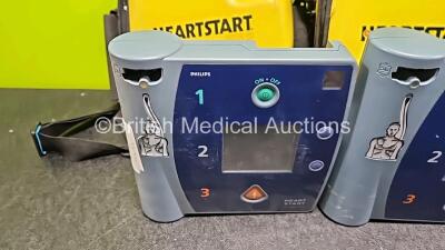 2 x Philips Heartstart FR2+ Defibrillators 1 x Power Up with Stock Power Supply Stock Power Not Included) in Case - 3