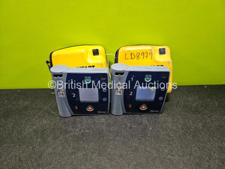 2 x Laerdal Heartstart FR2 Defibrillators (Both Power Up with Stock Power Supply Stock Power Not Included) in Case