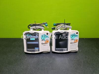 2 x Philips Heartstart MRx Defibrillators (Both Power Up with Stock Module, Stock Module Not Included) Including ECG and Printer Options with 2 x 3 Lead ECG Leads and 2 x Paddle Leads