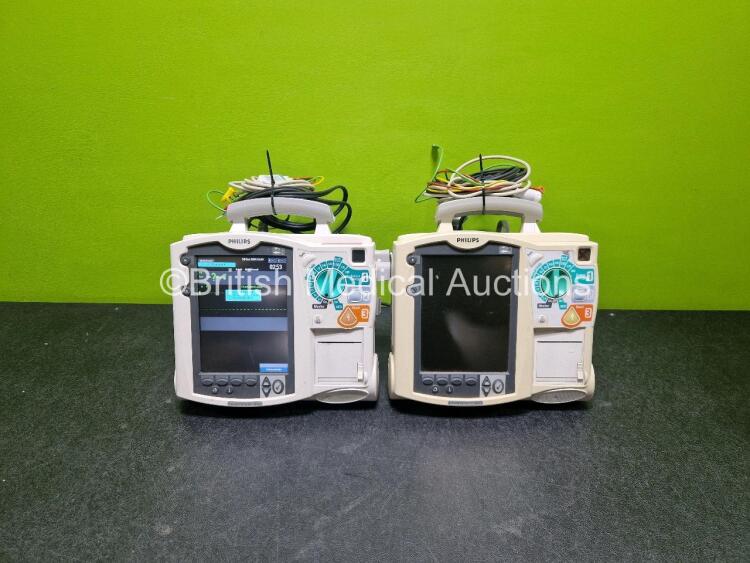 2 x Philips Heartstart MRx Defibrillators (Both Power Up with Stock Module, Stock Module Not Included) Including ECG and Printer Options with 2 x 3 Lead ECG Leads and 2 x Paddle Leads