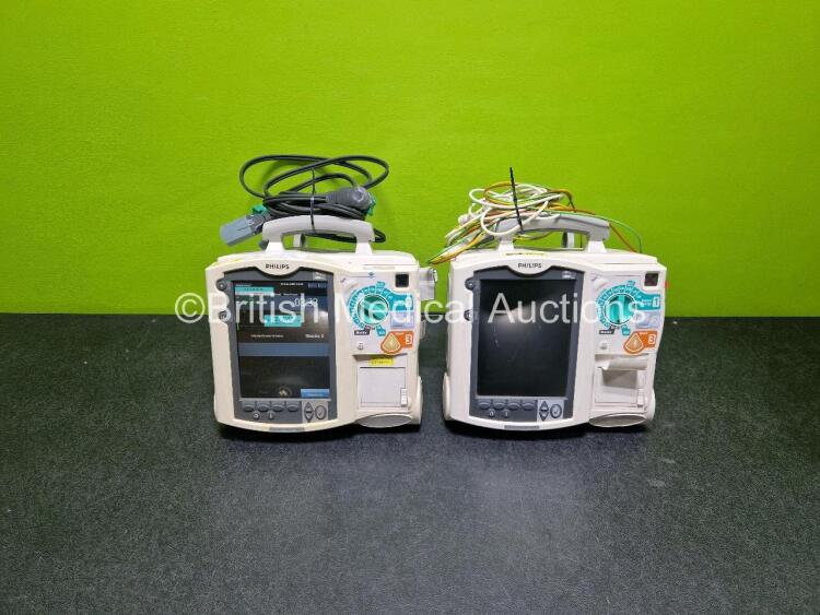 2 x Philips Heartstart MRx Defibrillators (Both Power Up with Stock Module, Stock Module Not Included) Including ECG and Printer Options with 2 x 3 Lead ECG Leads and 2 x Paddle Leads