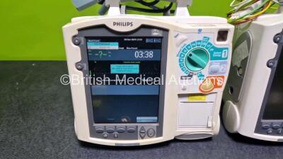 2 x Philips Heartstart MRx Defibrillators (Both Power Up with Stock Module, Stock Module Not Included) Including ECG and Printer Options with 2 x 3 Lead ECG Leads and 2 x Paddle Leads - 2