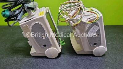 2 x Philips Heartstart MRx Defibrillators (Both Power Up with Stock Module, Stock Module Not Included) Including ECG and Printer Options with 2 x 3 Lead ECG Leads and 2 x Paddle Leads - 4