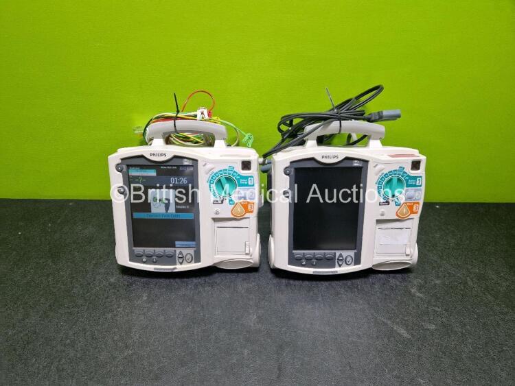 2 x Philips Heartstart MRx Defibrillators (Both Power Up with Stock Module, Stock Module Not Included) Including ECG and Printer Options with 2 x 3 Lead ECG Leads and 1 x Paddle Lead